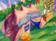 Next to Mrs. MacGrady's tent lies the Kissing Booth.