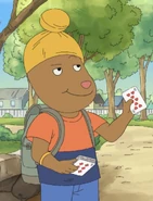 Samir holding cards.