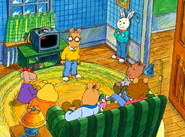 Arthur shows his friends and family proof about the plate