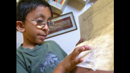 Nandan shows Buster his family tree
