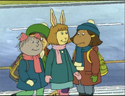 Maria wearing her winter clothes and walking with Jenna and Muffy.