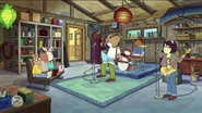 Mr. Ratburn playing guitar while Arthur, Buster, and Alan watch.