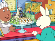 Buster being presented with a free ice cream in his daydream about a world without money.