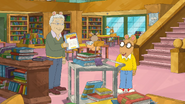 Marc Brown giving Arthur a book about drawing animals