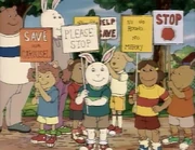 Wearing his other summer clothes.