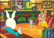 Arthur and Buster talking over milkshakes