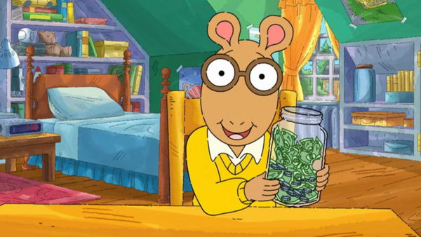 Arthur Holding the Jar of Saved Money