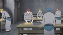 Gray priests making paper in the orphanage.