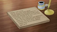 A letter written on a wooden board