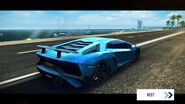 A post-race Lamborghini Aventador SV cruising southbound along the beachside road with the in-game version of the W Barcelona Hotel in the background.