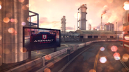 A billboard for Asphalt 9: Legends, as seen near the industrial fuel-refinery area.