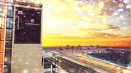 A billboard for Asphalt 9: Legends, as seen on top of the in-game version of the Hospital del Mar.