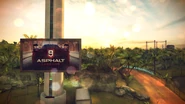 A billboard for Asphalt 9: Legends, placed at the base of the in-game version of the Changi Control Tower.