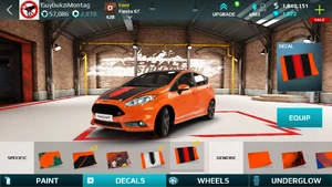 A Ford Fiesta ST in default orange-red equipped with the Stripes II decal
