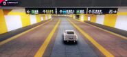 A Nissan 370Z Nismo crossing a pedestrian tunnel (人民广场) in the Paris of the East layout.