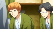 Mimura ooking over the "Top Girls" list with Takebayashi (S1E8).