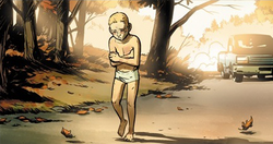 A young Daniel wandering down a country road