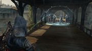 Ezio aiming a bomb at a group of guards