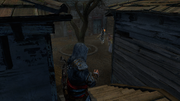 Ezio firing a poison dart at Mirela