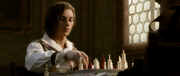 Ezio playing Chess.