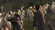 Ezio aiming a knife at Savonarola's hand