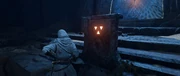 Basim placing three shards into one of the Northern Oasis vault's pedestals