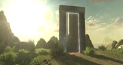 The doorway and the stone with the words "Fragments are the exit"
