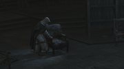 Altaïr sitting down for a rest
