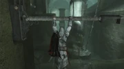 Visitazione's Secret 6.png (1,98 MB) Ezio activando uno de los interruptores.