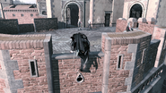 Ezio escaladant les remparts du Château Saint-Ange