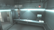 Desmond eavesdropping on Warren Vidic and Lucy Stillman through an air vent in the Abstergo laboratory