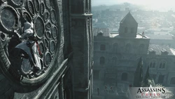 Altaïr escaladant la paroi d'une église