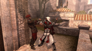 Ezio assassinating the second guard