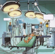 William overlooking Mike, just after the operation