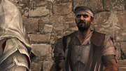 Ezio speaking with one of Mario's mercenaries