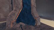 A mold containing space for a weapon in the shape of a halberd