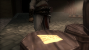 Altaïr discovering the note