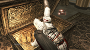 Ezio claiming the treasure