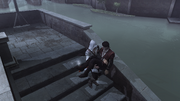 Federico's body being carried by Ezio