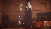 Bayek approaching the statue