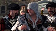 Ezio viene bloccato da due guardie.