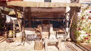 A blacksmith in his workshop in the 5th century BCE Greece