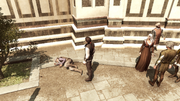 Ezio standing over the defeated Duccio