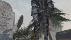 Connor poniendo una pluma en el ataúd de .