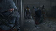 Ezio eavesdropping as Manuel examines the weapons