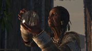 The Clan Mother holding a Crystal Ball