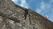 Edward scaling the fort's wall