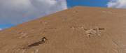 Bayek climbing up the pyramid