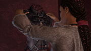 Aveline holding her Assassin robes