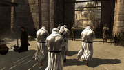 Altaïr blending with scholars to pass through the gate